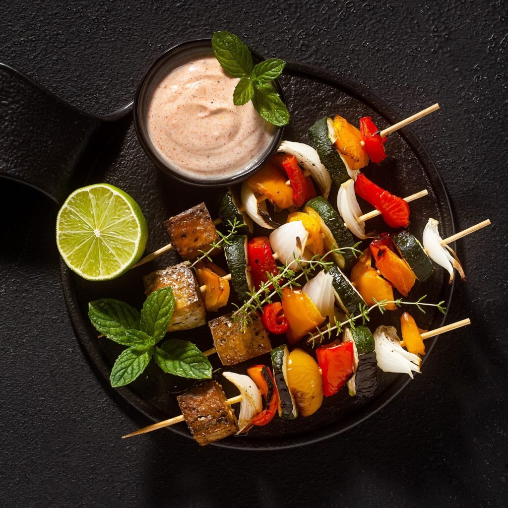 ready-vegan-kebabs-vegetables-smoked-tofu-with-cashew-sauce-smoked-paprika-black